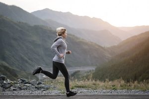 Woman Running a Mile to Check Current Health and Fitness Level