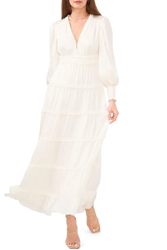 Contemporary White Maxi Dress Featuring a Deep V-Neck and Long Smocked Cuff Sleeves